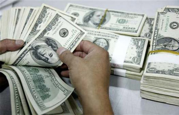 US dollar rises amid upbeat economic data